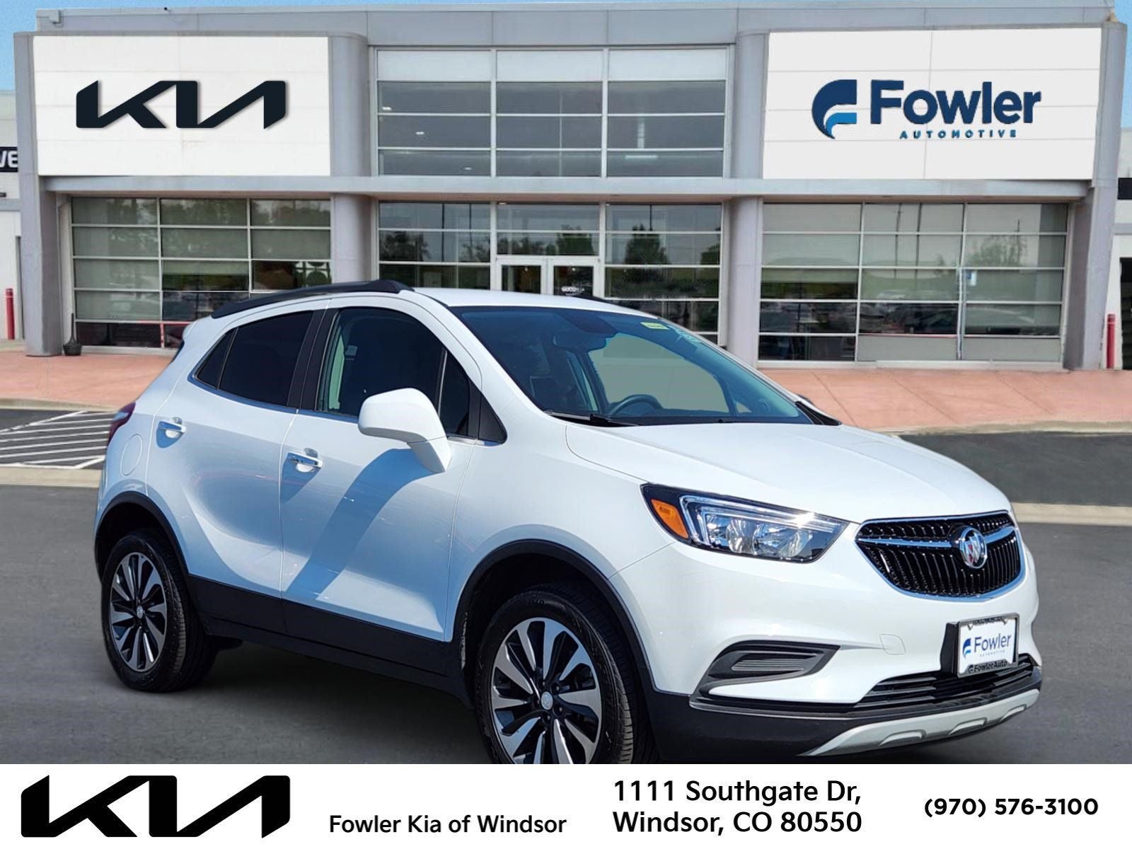 2021 Buick Encore Preferred AWD in Summit White — front three-quarter view