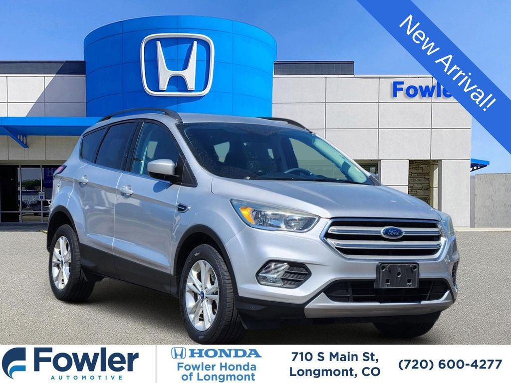 2018 Ford Escape SE in Ingot Silver — front three-quarter view